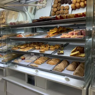 a display case full of baked goods