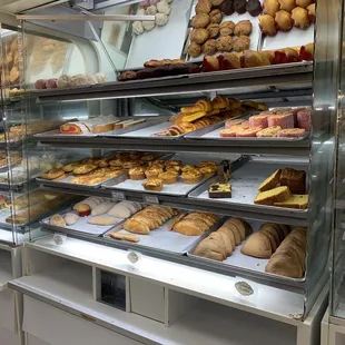 a display case full of baked goods