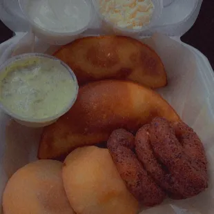 a box of donuts and dips