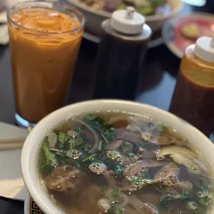 07A pho - pretty much has all the meats.  Thai iced tea. 1P. Bun Bo Hue (background)