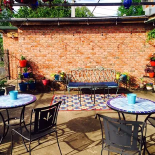 Outdoor seating and fresh herbs available during spring and summer seasons!