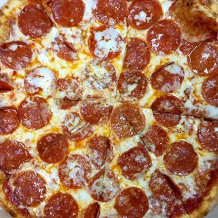 Pizza made fresh. Homemade dough and sauce made with organic herbs.