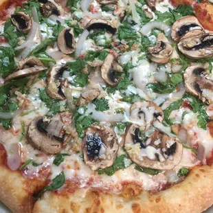 Mushroom and spinach pizza