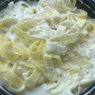 A side of fettuccine Alfredo that was definitely as big as a full portion. Only $6.
