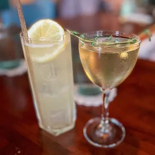 a glass of wine and a glass of lemonade