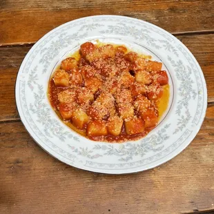 Gnocchi with a tomato based sauce