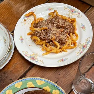 Pork ragú! If this is on the menu when you go, get it. Just trust me.