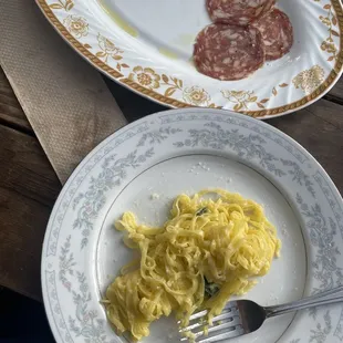 Appetizer of &quot;Salumi&quot; and main course of vegetarian pasta with a sage sauce.