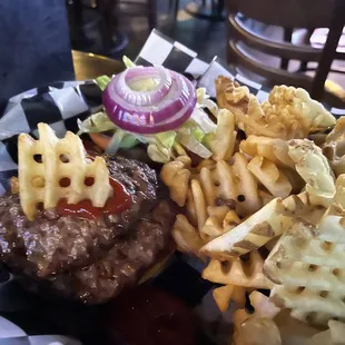 Burger lettuce onions and waffle fries