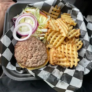 Burger with lettuce and onions with waffle fries