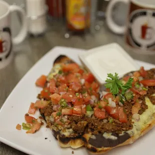 MOLLETES : TRADITIONAL MEXICAN BOLILLO BREAD, REFRIED BEANS FRESH PICO DE GALLO ASK FOR MEAT IF YOU LIKE