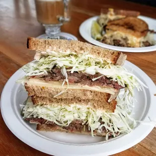 Housemade pastrami with coleslaw, swiss, and a house Russian sauce from Pastrami Zombie