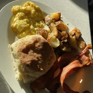 traditional southern breakfast 10.50 with scrambled eggs with cheese, biscuits, homefries, bacon