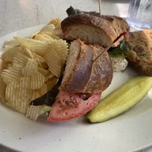 Sandwich a go go (chicken salad, croissant with gouda), chips, cookie and a pickle. Yum.