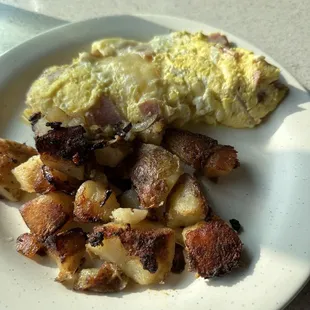 Ham and Swiss omelet with home fries