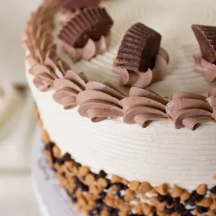 ows a cake decorated with chocolates