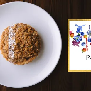 a plate of pastries and a book