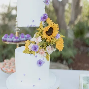 our gorgeous wedding cake! flavors were exotic paradise (guava passion fruit) and strawberry shortie!