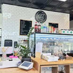 a bakery counter with a variety of pastries