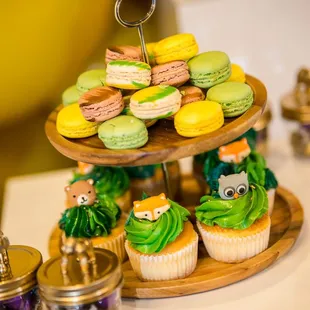  display of cupcakes and macarons