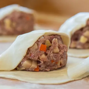 The beef pasty is made with our premium beef, potatoes, carrots, onions, mixed with a blend of our secret spices.