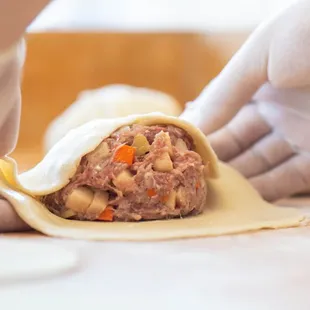 The beef pasty is made with our premium beef, potatoes, carrots, onions, mixed with a blend of our secret spices.