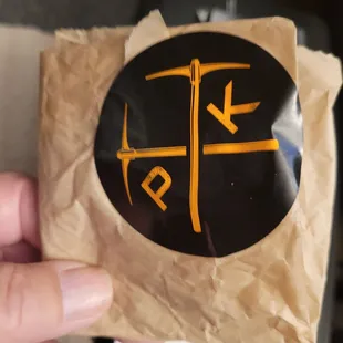 A wrapper with a IYKYK logo.