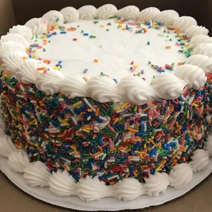 ows a cake in a box