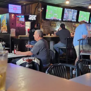 people sitting at the bar