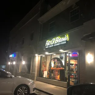the front of a restaurant at night