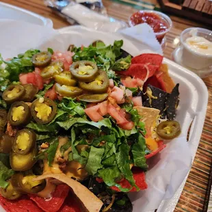 Nachos. Could be eons better with melted cheese.