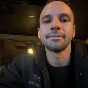 a man in a black jacket