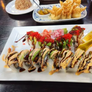 Crab Rangoon, caterpillar roll, and dragon roll.