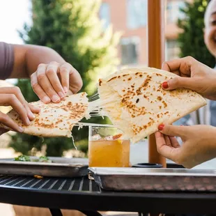 a group of people eating at a table