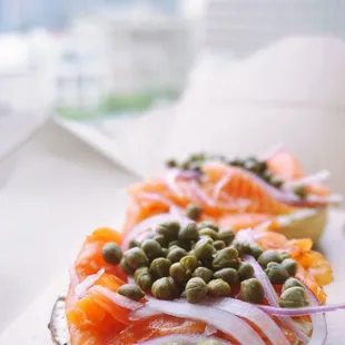 Housemade Lox: everything bagel, cream cheese, red onion ($13).