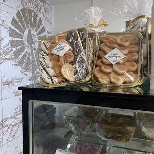 a display case filled with pastries