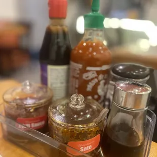 House made chili oil and sate sauce