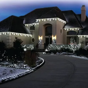 a house decorated with christmas lights