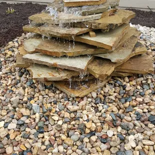 a fountain made of rocks