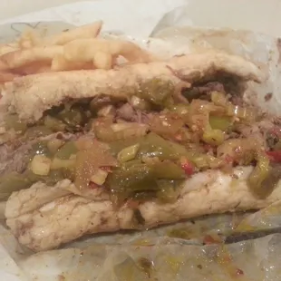 Italian beef, sweet and hot peppers, extra dipped with order of fries.