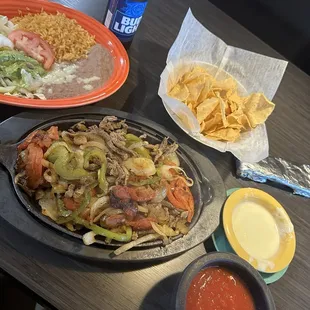 Beef fajitas, cheese dip, and salsa and chips. Big portion and it was excellent!