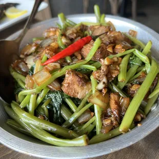 This think this is the Adobong Kangkong Stir-fried water spinach with pork. Forgot which one!!