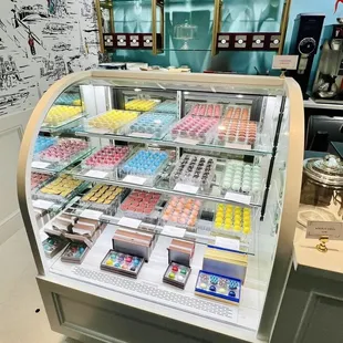 a display case filled with sweets