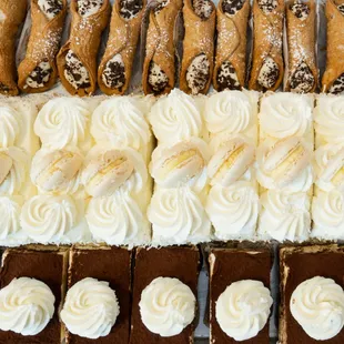 Daily Display.... Cannolis, Coconut Cake, Tiramasu