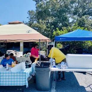a group of people under a tent