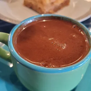 Turkish coffe w baklava in the background