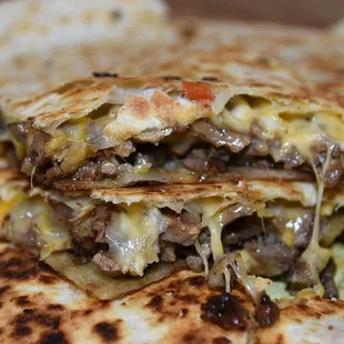 a close up of a quesadilla