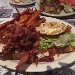Food is awesome and great prices.  Their sweet potato fries are the bomb.  I had a BLT w a fried egg ,Yikes so big!!!