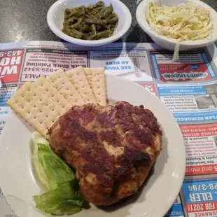 Big ole yummy crab cake with 2 sides at $13.99 and &quot;I love this bar&quot; playing on jukebox.
