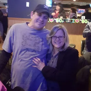a man and woman posing for a picture